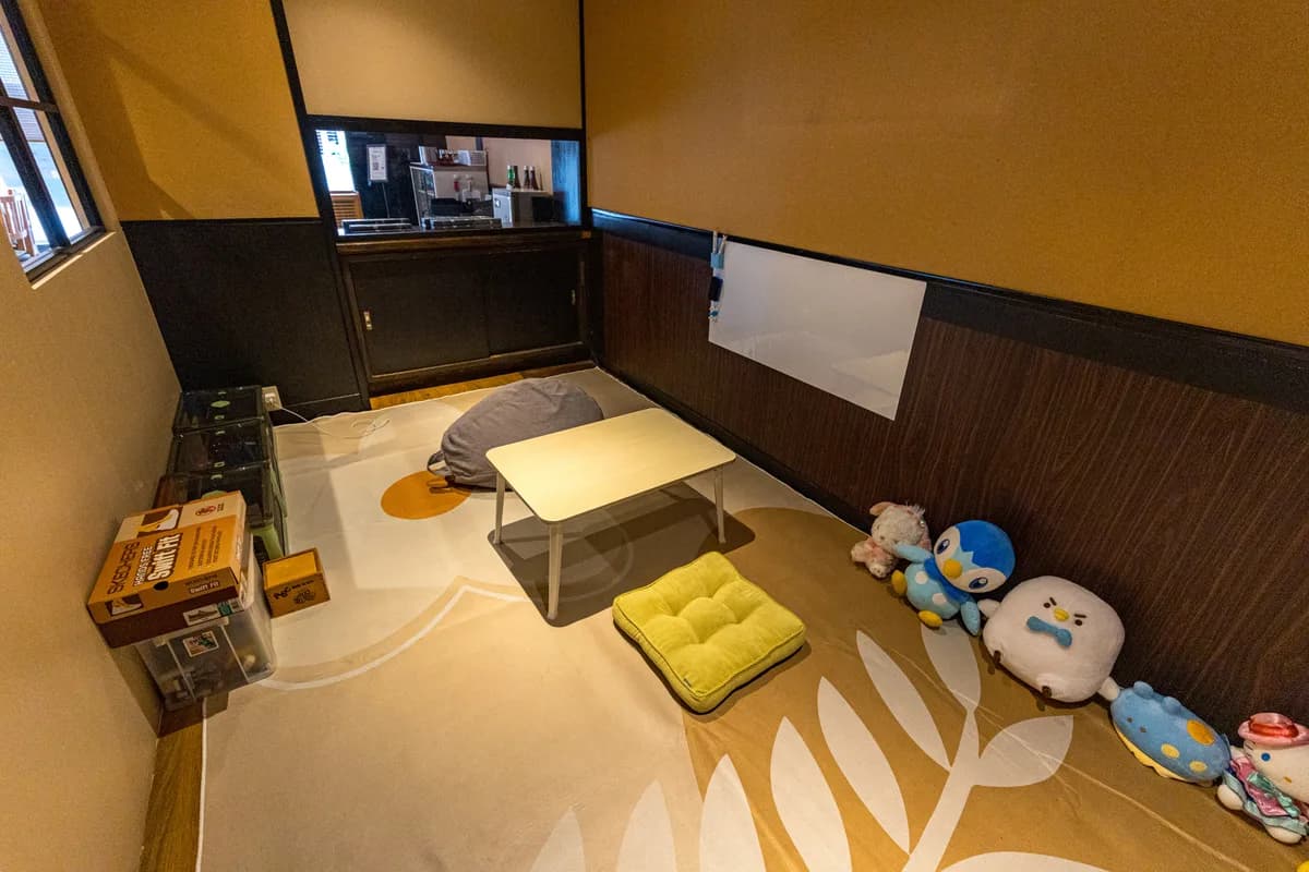 The private kids room at REONA Sushi Tokyo with toys and a drawing space